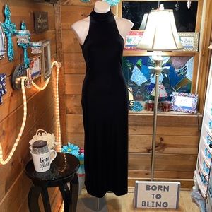 Black velvet formal halter dress size 2 from a boutique in Paris worn once